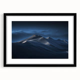 Framed black wall art showcasing a serene desert landscape with rolling dunes, complemented by a white mat, perfect for modern home decor and aesthetic enhancement.