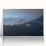 Framed acrylic wall art showcasing a serene desert landscape with golden dunes and a blue sky, perfect for enhancing modern home decor.