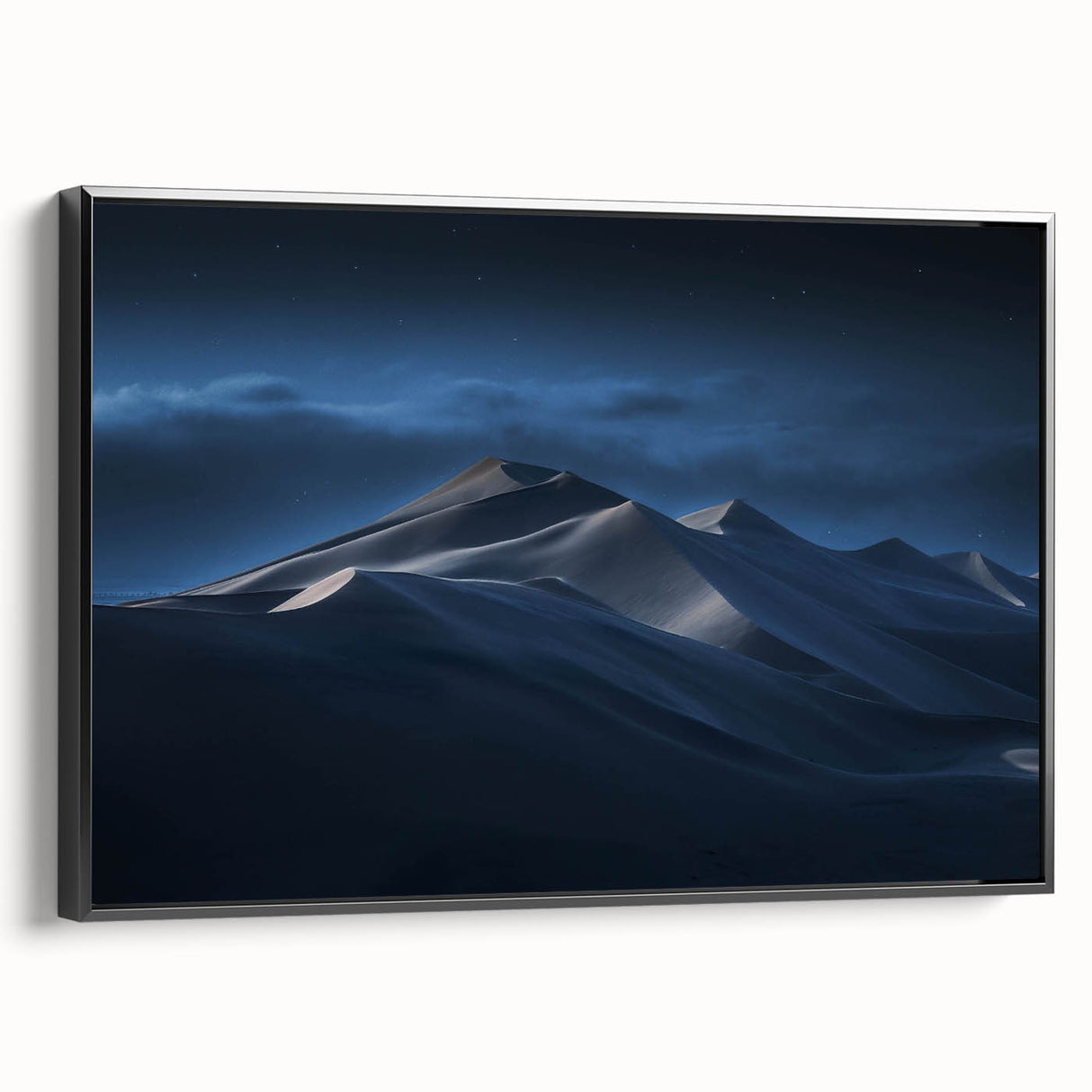 Framed canvas wall art showcasing a stunning desert dune landscape with warm beige and golden tones, enhancing modern home decor with a sleek black frame.