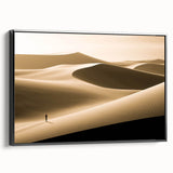 Framed canvas wall art showcasing a serene desert dune landscape design, featuring soft beige and brown tones with a sleek black frame, perfect for modern decor.
