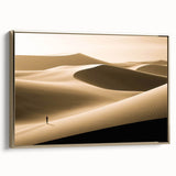 Framed canvas wall art featuring a serene desert landscape with golden dunes, showcasing warm tones and intricate textures, perfect for modern home decor.