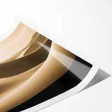 Vibrant rolled wall art print depicting serene desert dunes at sunset, showcasing warm orange and yellow hues, perfect for enhancing home decor aesthetics.