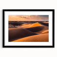Framed wall art collection showcasing a serene dune landscape, featuring a black mat and sleek black frame, perfect for modern home decor.