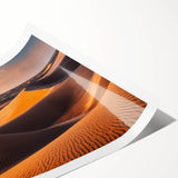 Vibrant rolled print showcasing a serene desert landscape with golden dunes under a blue sky, perfect for enhancing modern interior decor. Ideal for wall art enthusiasts.
