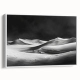 Framed canvas wall art showcasing a serene landscape of sand dunes, featuring soft beige and golden hues, perfect for enhancing modern home decor.