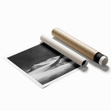 Desert landscape wall art print showcasing vibrant sand dunes under a blue sky, rolled and ready for framing, perfect for modern home decor.