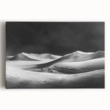 Stretched canvas wall art depicting a serene desert landscape with rolling sand dunes under a vibrant sunset, perfect for enhancing modern home decor.