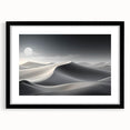 Framed black wall art showcasing a serene desert dunes landscape with soft beige and golden tones, designed to enhance modern home decor aesthetics.