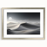 Framed wall art featuring a serene desert landscape with soft dunes in beige and gold tones, elegantly matted and set in a silver frame, ideal for home decor.