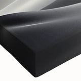 Close-up of a stretched canvas wall art piece depicting vibrant desert dunes with rich textures and warm tones, perfect for modern home decor and interior design.