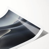 Abstract desert landscape wall art print showcasing soft beige and warm orange dunes under a clear blue sky, rolled for easy transport and display.