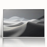 Framed wall art collection showcasing a serene desert landscape with gentle sand dunes, presented in a sleek white frame, perfect for modern home decor.
