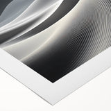 Rolled canvas artwork showcasing an abstract desert landscape with vibrant orange and yellow dunes under a blue sky, perfect for enhancing home decor.