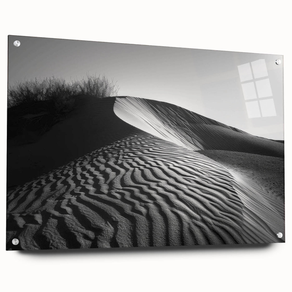 Acrylic glass wall art showcasing a stunning desert dune landscape in warm tones, elegantly presented from a side view with visible pins for mounting.