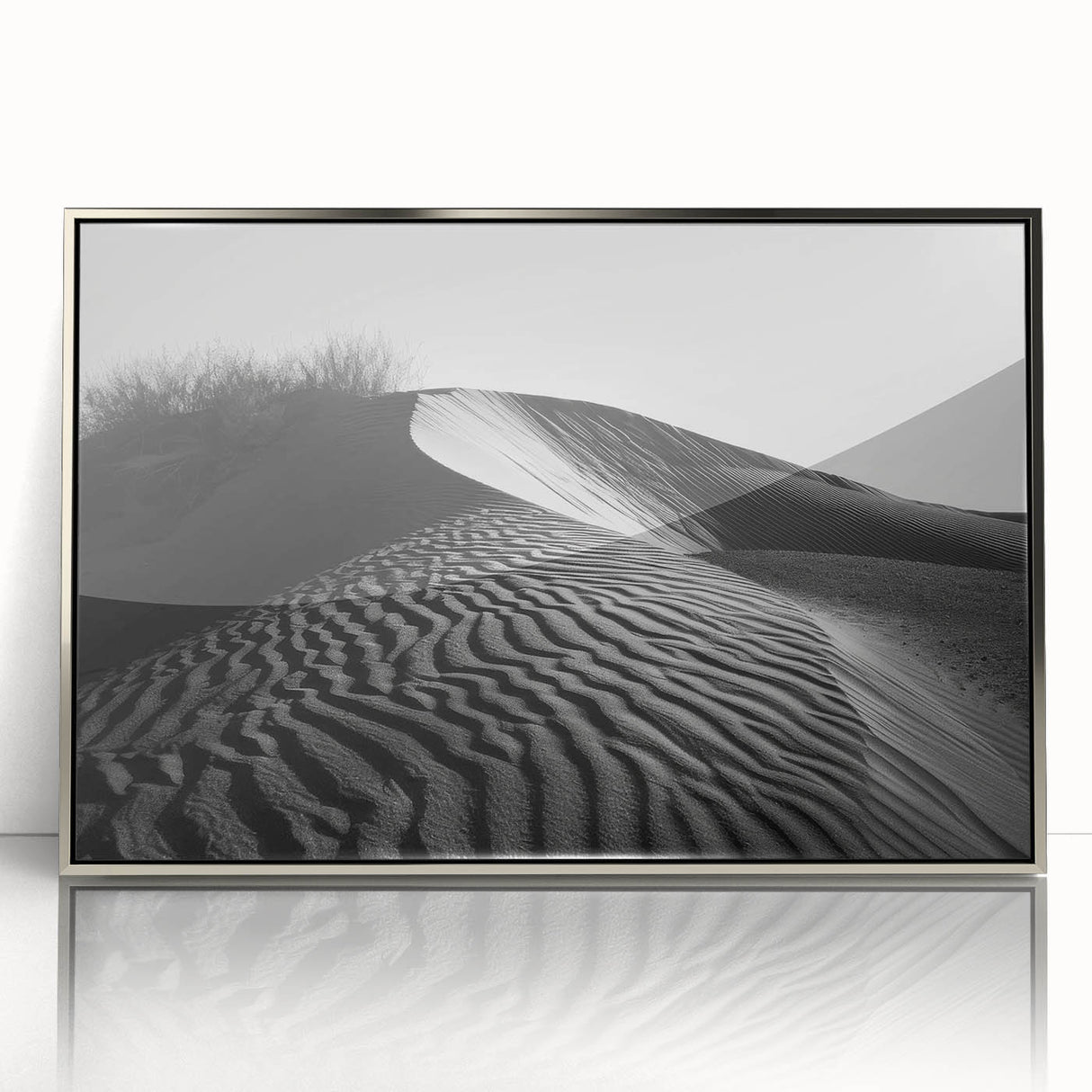 Framed acrylic wall art featuring a stunning landscape design of rolling sand dunes in warm earthy tones, elegantly displayed with a silver frame, ideal for home decor.