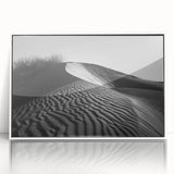 Framed acrylic wall art showcasing a stunning desert dune landscape with soft golden hues and intricate textures, designed for modern decor enthusiasts.