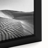 Framed canvas wall art showcasing a close-up of serene sand dunes, emphasizing warm beige and golden tones, perfect for enhancing modern interior decor.
