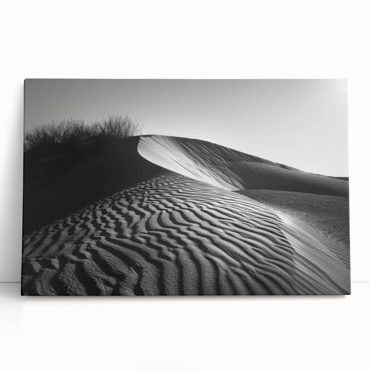 Stretched canvas wall art featuring a serene desert landscape with soft beige dunes and a vibrant blue sky, perfect for enhancing modern home decor.