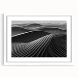 Framed wall art featuring a serene desert landscape with soft dunes in neutral tones, set in a white mat and frame, perfect for modern home decor.
