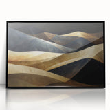 Framed acrylic wall art of desert dunes, showcasing warm sandy tones and smooth curves, presented in a sleek black frame for modern decor. Perfect for enhancing contemporary living spaces.