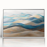Framed acrylic wall art showcasing a serene landscape of rolling sand dunes, featuring soft golden hues and a minimalist white frame, ideal for modern decor.
