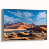 Framed canvas wall art showcasing a serene desert landscape with rolling dunes, elegantly bordered in silver, perfect for modern home decor.