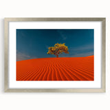 Framed landscape wall art featuring serene sand dunes in soft beige and gold tones, with a sleek silver mat and frame, perfect for modern home decor.