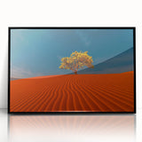 Framed acrylic wall art featuring a serene desert landscape with expansive sand dunes, presented in a sleek black frame, ideal for modern home decor.