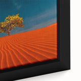 Close-up of a framed canvas art piece showcasing a serene desert landscape with soft dunes and warm hues, perfect for modern home decor.