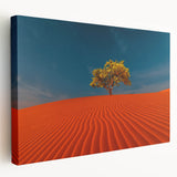 Stretched canvas wall art showcasing a serene desert landscape with golden dunes, perfect for adding warmth to modern interiors. The side view highlights its premium finish and vibrant colors.