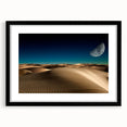 Framed wall art featuring a serene dune landscape design, presented in a sleek black frame with a white mat, ideal for modern home decor.