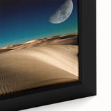 Close-up of a framed canvas wall art showcasing a serene desert landscape with soft dunes, warm beige tones, and gentle shadows, perfect for home décor.