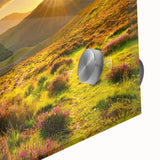 Close-up of a vibrant acrylic glass wall art piece showcasing a serene landscape with rolling fields and lush greenery, perfect for home decor.