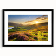 Black-framed wall art featuring a scenic landscape with vibrant green fields and blue skies, designed to enhance home decor and create a calming atmosphere.
