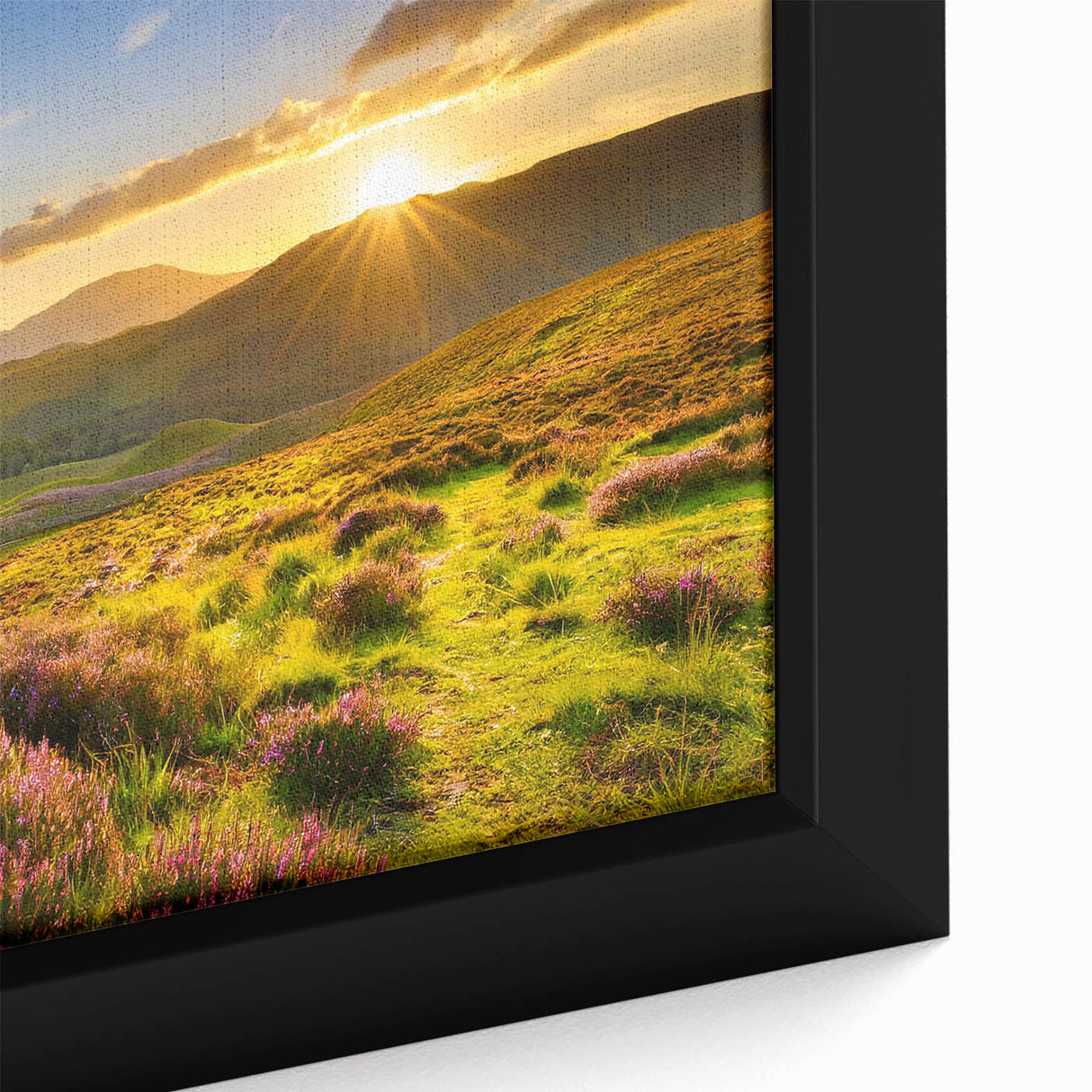 Close-up of a framed canvas artwork showcasing a vibrant landscape with lush green fields and a serene blue sky, perfect for home or office decor.