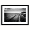 Framed landscape wall art featuring a serene field design with a black mat, ideal for home decor. Stylish front view showcases the intricate details and vibrant colors. Perfect for enhancing living spaces with nature-inspired aesthetics.