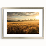 Framed wall art featuring a serene landscape of golden fields under a bright blue sky, with a silver mat that enhances its elegance, perfect for home decor.