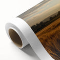 Vibrant rolled canvas showcasing a serene landscape with lush green fields and a dramatic sky, perfect for home decor or art enthusiasts, delivered in protective packaging.