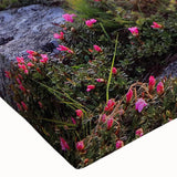 Close-up of a stretched canvas showcasing vibrant landscape fields in rich greens and yellows, perfect for enhancing home decor with nature-inspired art.