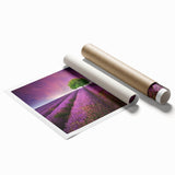 Vibrant rolled print of a serene landscape featuring lush green fields and a clear blue sky, ideal for home decor, showcasing nature's beauty in wall art.