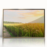 Framed wall art featuring a vibrant landscape design with fields in rich greens and golds, showcasing a modern aesthetic in a stylish acrylic finish.