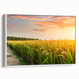 Framed canvas wall art showcasing a scenic landscape of vibrant green fields and blue skies, presented from a side view against a white background, perfect for home decor.