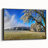 Framed canvas wall art showcasing a serene landscape of rolling fields in earthy tones, displayed from a black side view, ideal for enhancing home decor.