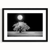 Framed wall art featuring a serene landscape with fields and vibrant colors, set in a sleek black frame with a white mat, perfect for home décor.