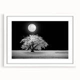 Framed wall art featuring a serene landscape design with lush green fields and a bright blue sky, presented in a sleek white frame with a mat. Ideal for home decor.