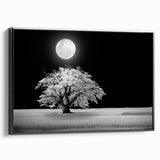 Framed canvas wall art showcasing a serene landscape of rolling fields in soft green and golden hues. The black frame adds a modern touch, enhancing the artwork's elegance. Ideal for home decor.