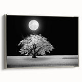Framed canvas wall art featuring a serene landscape design with lush green fields and a vibrant sunset, set in a sleek silver frame, ideal for home decor.