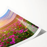 Vibrant landscape wall art print showcasing lush green fields under a clear blue sky, ideal for home decor. The rolled canvas is ready for framing and adds a serene touch to any space.