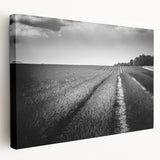 Stretched canvas artwork showcasing a vibrant landscape design featuring fields in rich greens and golds, ideal for home decor and adding natural beauty to interiors.