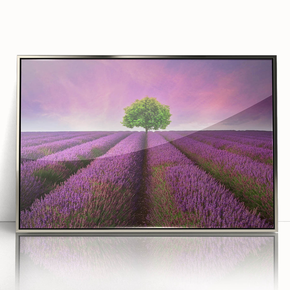 Framed wall art collection showcasing a serene landscape of rolling fields, with a silver acrylic front for a modern touch, perfect for home decor.